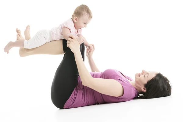 Mother and baby gymnastics yoga — Stockfoto