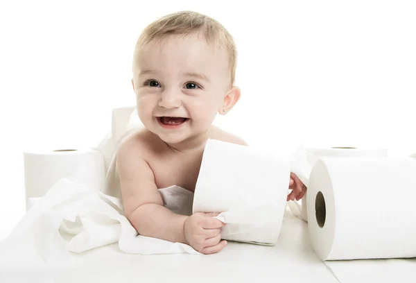 Toddler ripping up toilet paper in bathroom studio — Stock Photo, Image