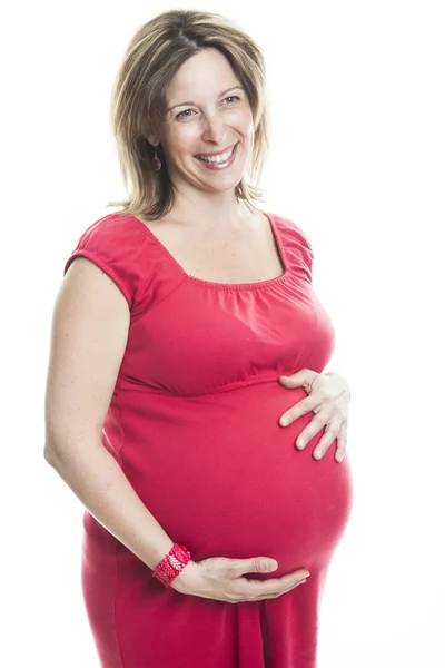 Retrato de estudio de una hermosa joven embarazada aislada sobre fondo blanco —  Fotos de Stock