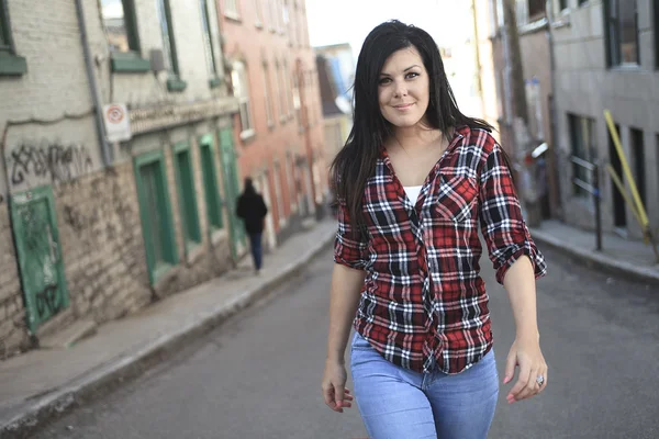 Cheerful woman in the street walking — Stock Photo, Image