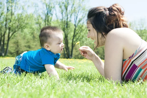 Beautiful mother and little baby boy in forest — Stock Photo, Image