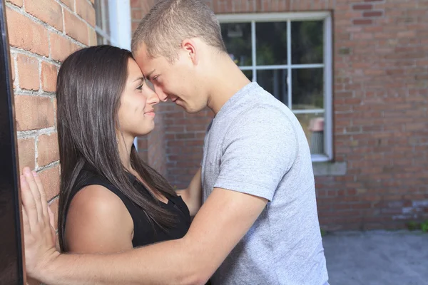 Young adult couple outside having good time — Stock Photo, Image