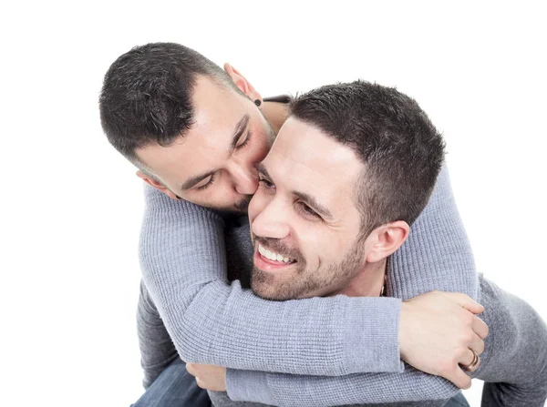 Una pareja homosexual sobre un fondo blanco — Foto de Stock