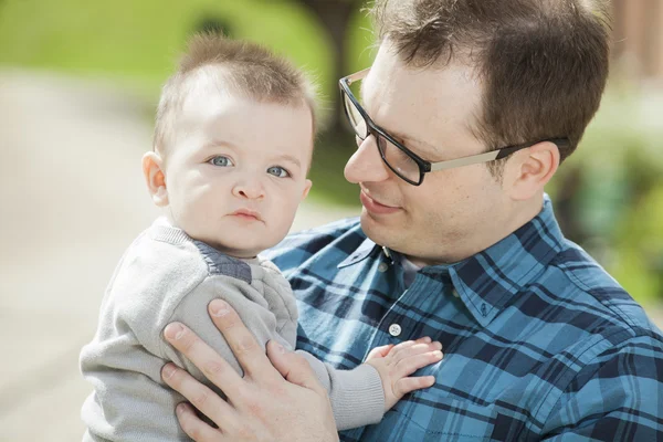 Little baby and father having fun outdoors — Stock Photo, Image