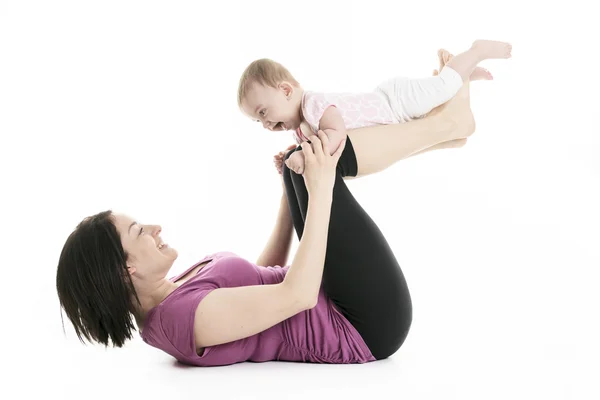 Mother and baby gymnastics yoga — Stockfoto