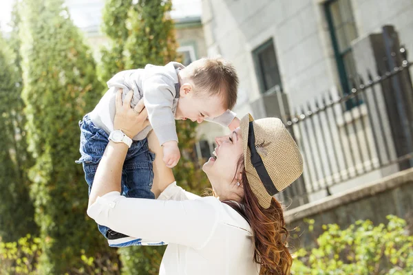 Young mother with her baby boy — Stock Photo, Image