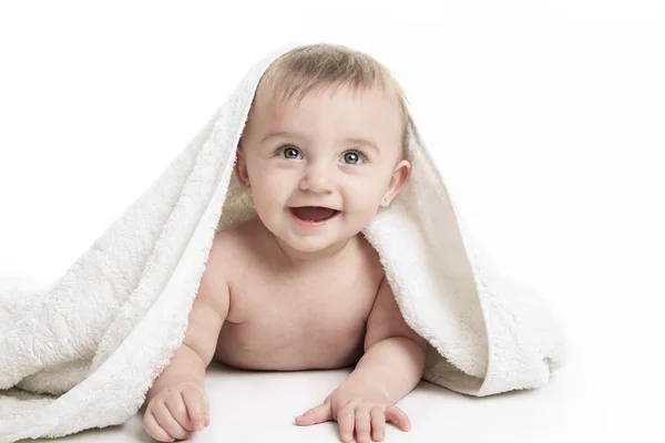 Sweet small baby covered with a towel — Stock Photo, Image