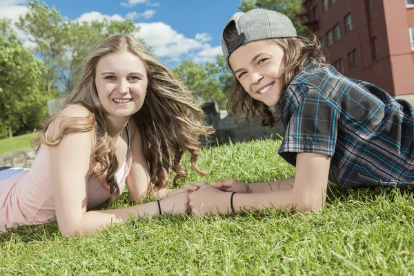 Picture of brother and sister having fun in the park — Stock Photo, Image