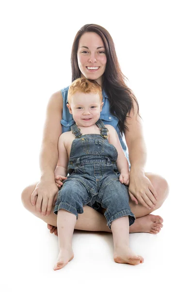 Baby boy with his mother over a isolated white background — Stock Photo, Image