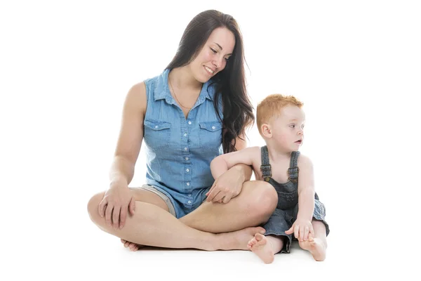 Baby boy with his mother over a isolated white background — Stock Fotó