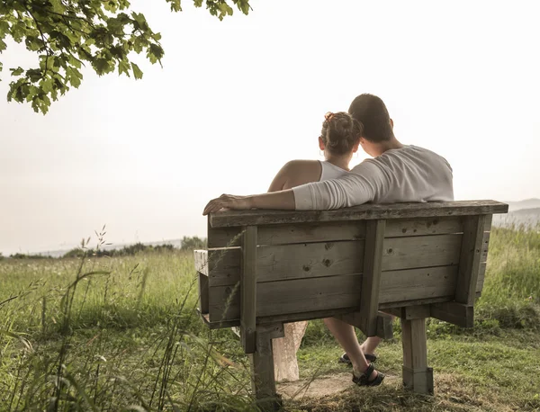 Young couple in love outdoor at the sunset — Stock Photo, Image