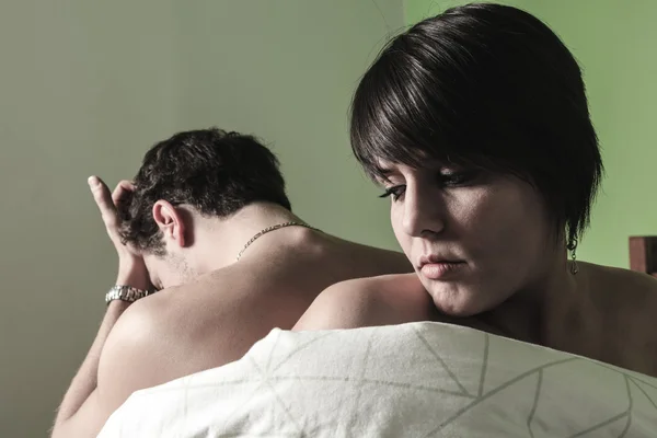 Young couple who having problem in bed — Stock Photo, Image