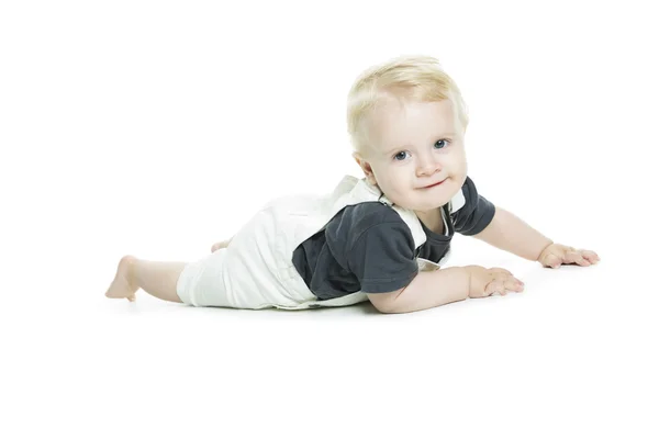 Söt baby med stora blå ögon i denim på vit bakgrund. — Stockfoto