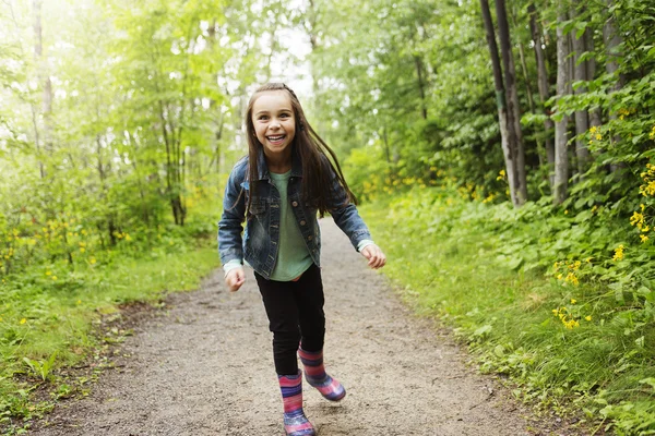 Adorable little girl in the forest meadow — Stock Photo, Image