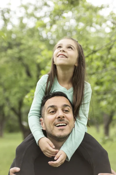 Father and son in forest on a meadow — Stock Photo, Image