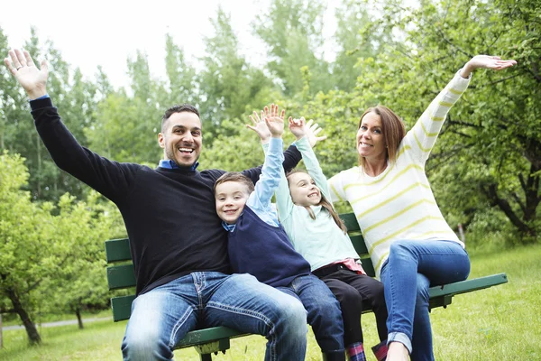 Family in forest having fun together — Stock Photo, Image