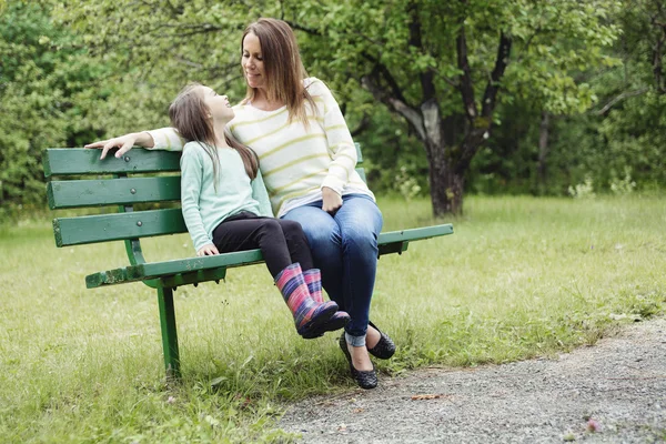 Mother and daughter in forest on a meadow — Stock Photo, Image