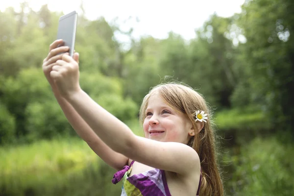 Adorable little girl in the forest meadow — Stock Photo, Image