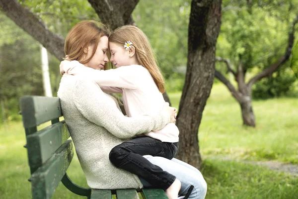 Mother and daughter in forest together — Stock Photo, Image