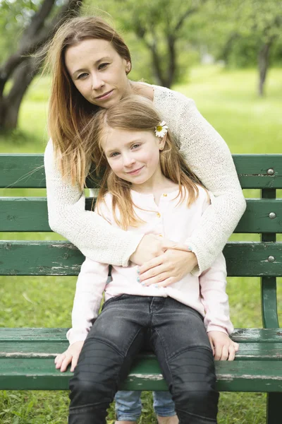 Mother and daughter in forest together — Stock Photo, Image