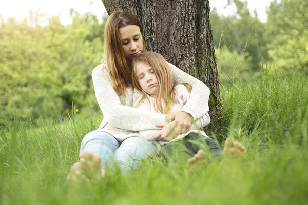 Mother and daughter in forest together — Stock Photo, Image