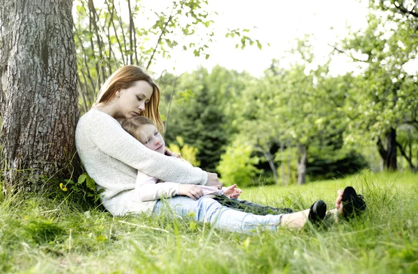 Mother and daughter in forest together — Stock Photo, Image