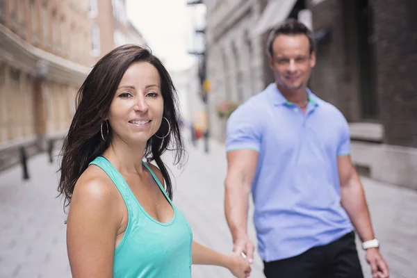 Urban couple on a street having fun — Stock Photo, Image