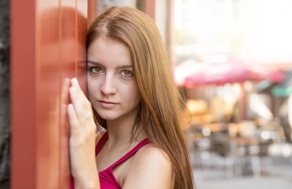 Young happy teenage girl in urban place — Stock Photo, Image