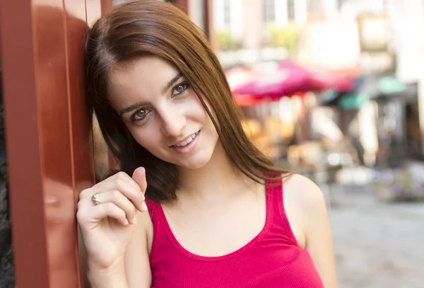 Young happy teenage girl in urban place — Stock Photo, Image