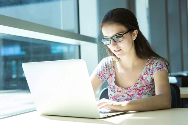 Young handsome female student at the college — Stock Photo, Image