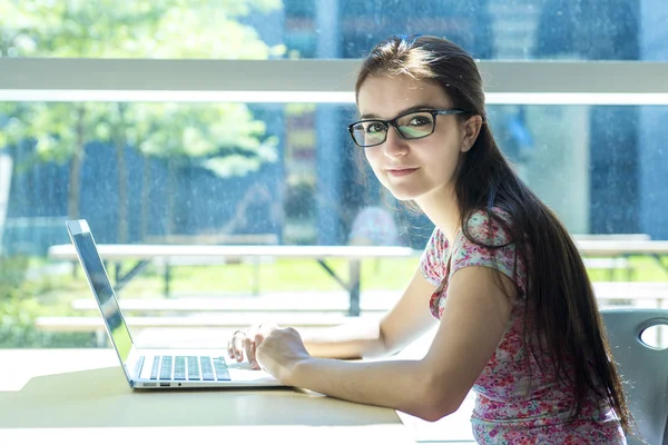 Young handsome female student at the college — Stock Photo, Image