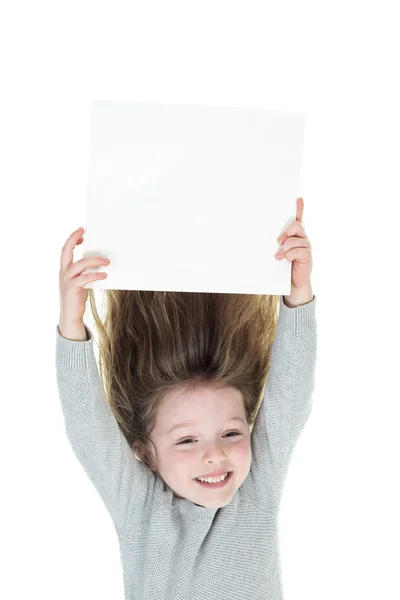 Junges Mädchen kopfüber isoliert in weiß — Stockfoto