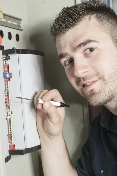 Portrait of an electrician in a room — Stock Photo, Image