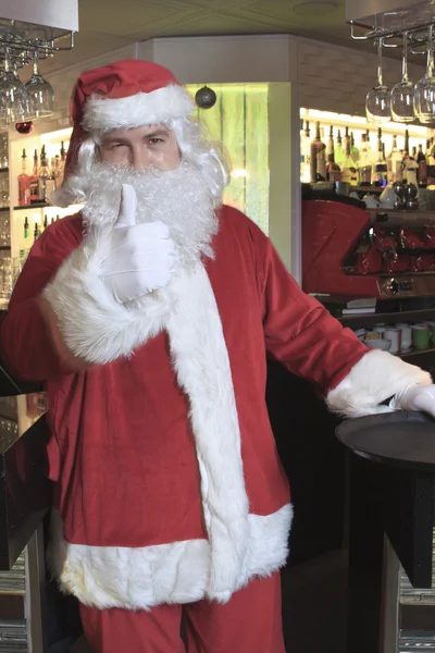 Santa claus looking at camera in the bar — Stock Photo, Image