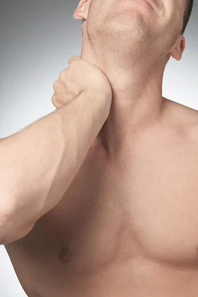 Young man with neck pain — Stock Photo, Image