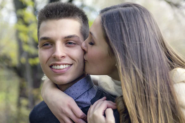 Teen couple at autumn park — Stock Photo, Image