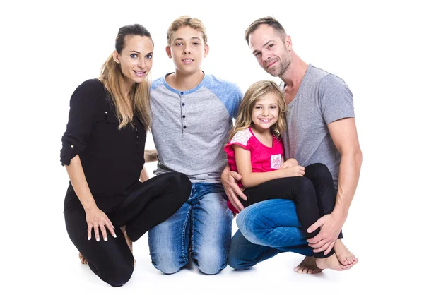 Prachtige familie op studio witte achtergrond — Stockfoto