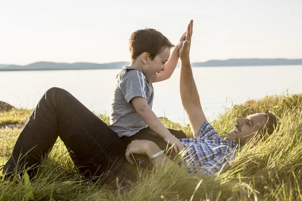 Father with is son at the sunset — Stock Photo, Image