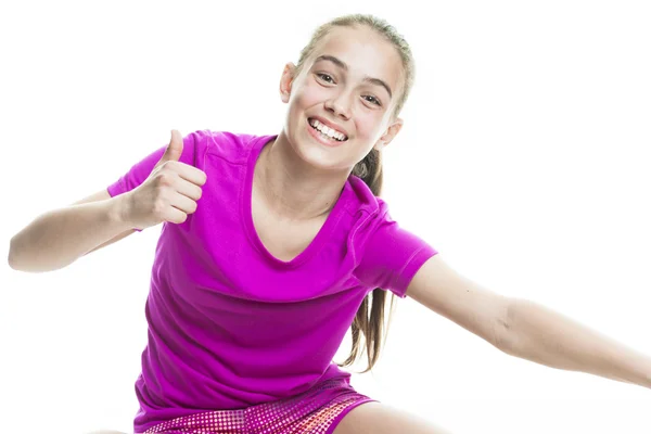Running young girl in sport cothes, white background — Stock Photo, Image