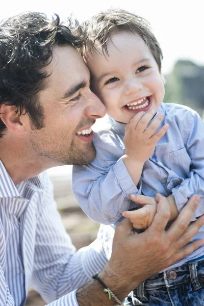 Happy joyful father having fun with is child — Stock Photo, Image