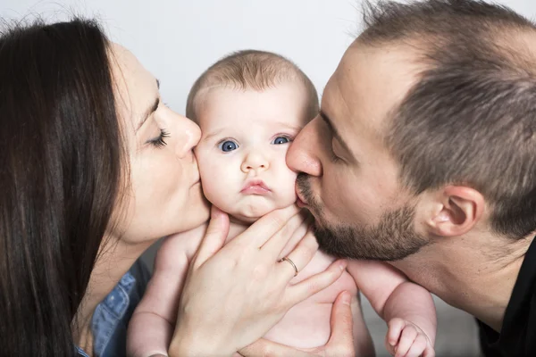 Portrait of a sleeping baby and parents — Stock Photo, Image