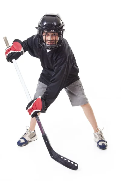 Hockey player over white background — Stock Photo, Image
