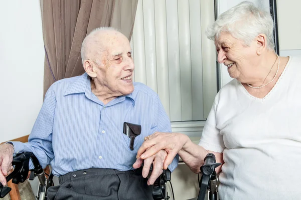 Close-up portrait of an elder couple at home — Stock Photo, Image