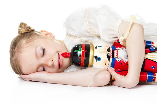 Ballerina who holding a nutcracker — Stock Photo, Image