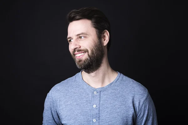 Portrait of a men with beard and mustache in studio black background — Stock Photo, Image