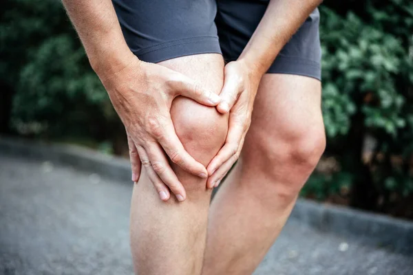 Man having meniscus tear in his knee, knee sports injuries