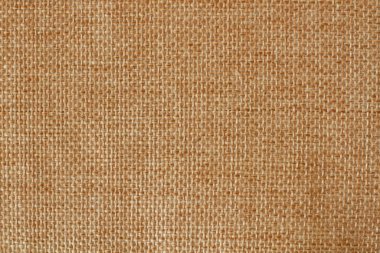 Kahverengi çuval bezi dokusu veya arka plan ve boş alan. makro fotoğraf