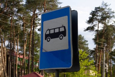 Bus stop sign in a village village