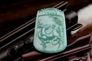 Jade pendant with Chinese characteristics clipart