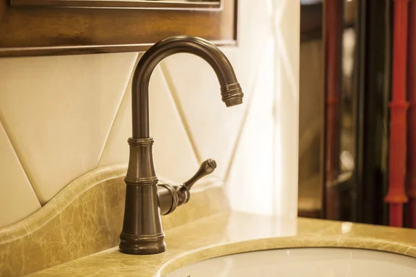 Closeup of water-supply faucet isolated in modern bathroom — Stock Photo, Image